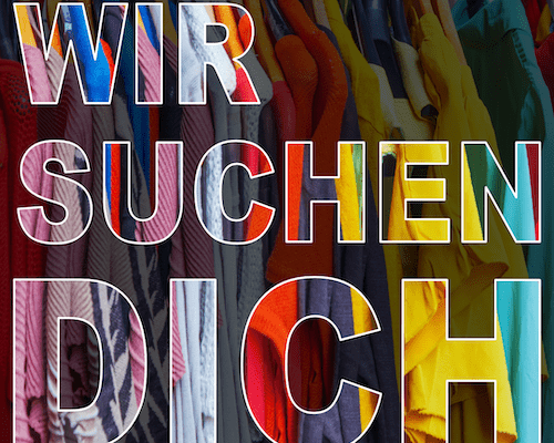 Schriftzug "Wir suchen dich" vor dunklem Hintergrund